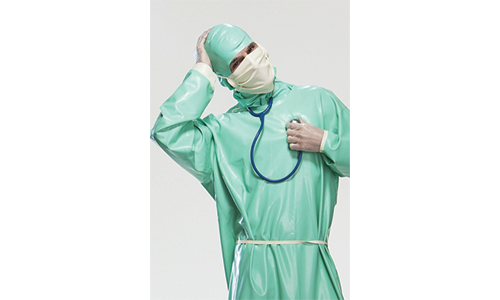 A Doctor Wearing A Surgical Gown