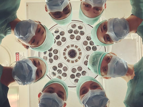 Nurses Wearing Scrub Caps